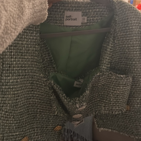 Green Bouclé Cropped Jacket with matching bralette(size 10)
This cropped jacket - Picture 9 of 9